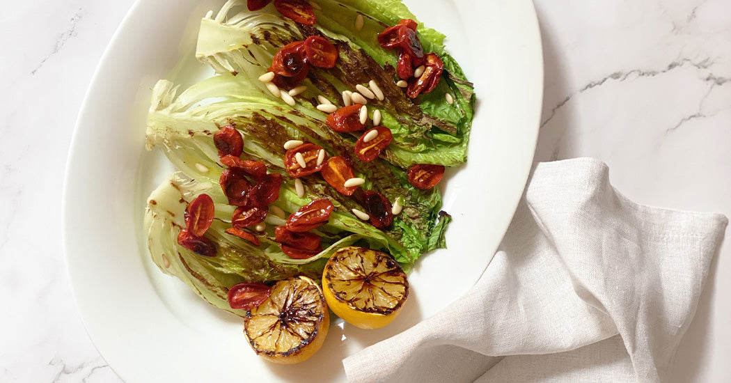 Grilled Romaine Hearts with Roasted Pine Nuts and Oven-Dried Cherry Tomatoes Recipes
