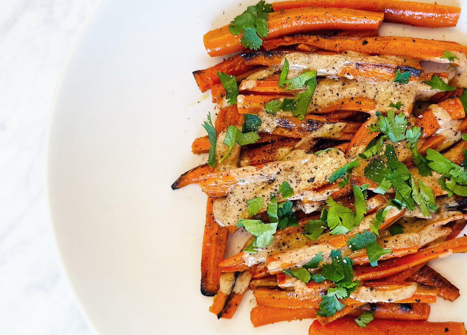 Roasted Heirloom Carrots with Creamy Almond Butter Drizzle