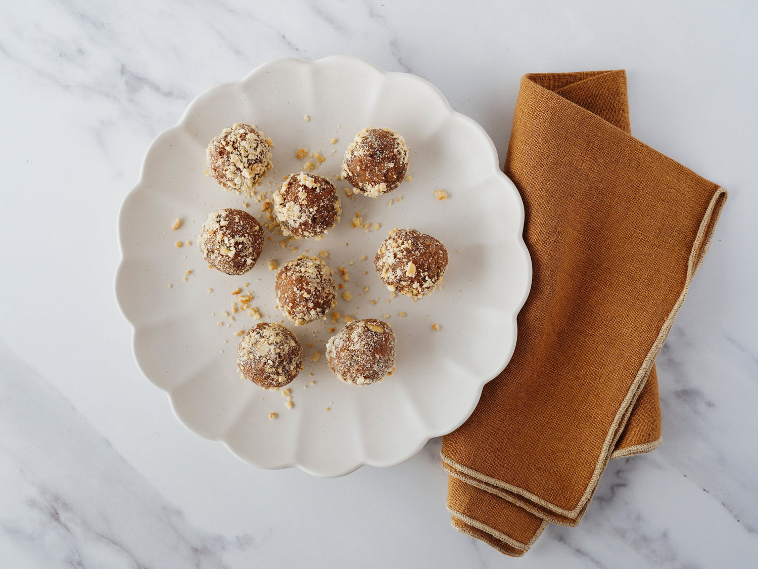 Almond butter keto bombs rolled in cashew crunch