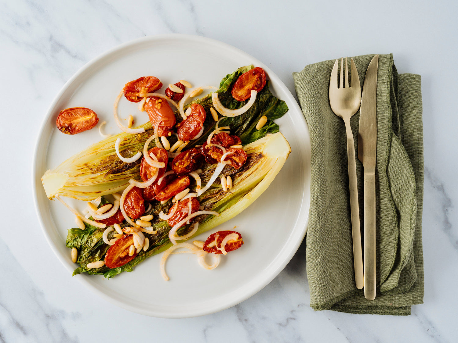 Grilled Romaine Hearts with Roasted Pine Nuts and Oven-Dried Cherry Tomatoes
