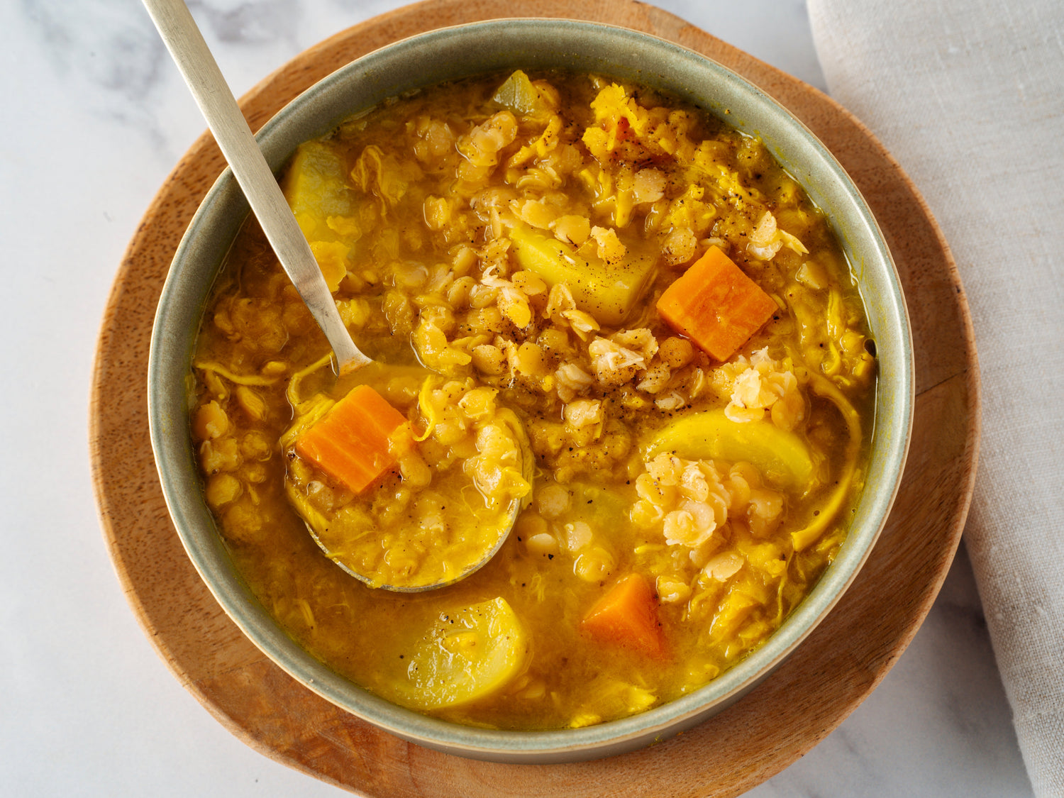 White Turmeric Chicken Chowder with Lentils and Root Vegetables